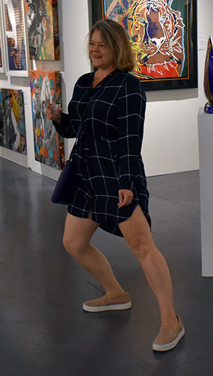 Viewer dancing to sculpture