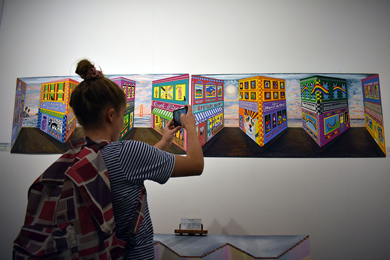 Viewer Photographing Sculpture